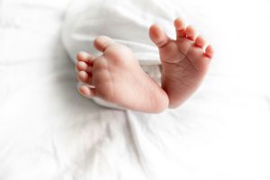 Create a gift basket for a NICU graduate.