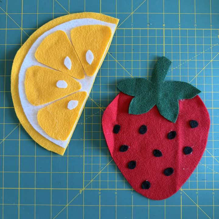 Large lemon slice and strawberry made of felt to be used a preemie Halloween costume.