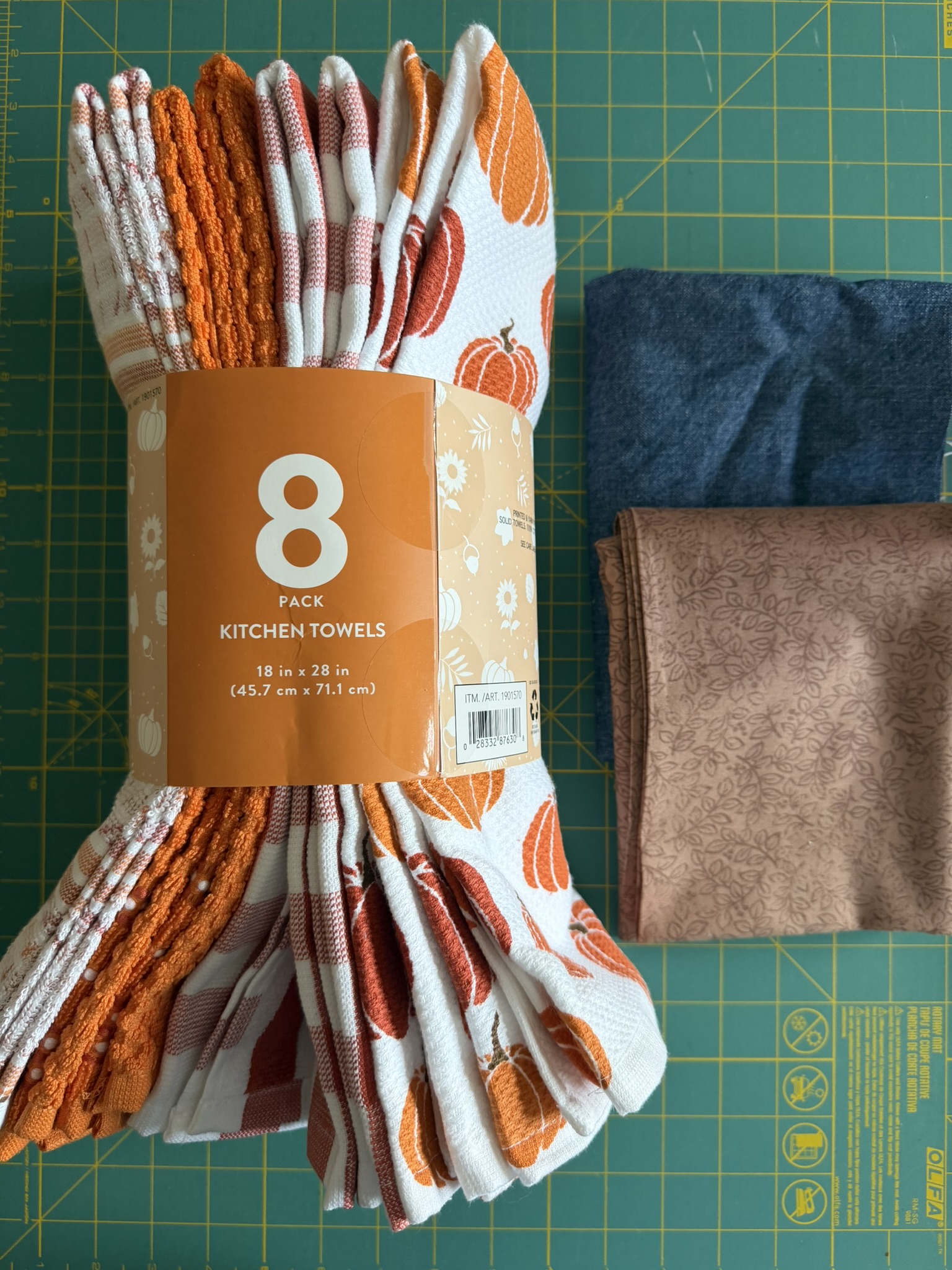 DIY Fall hanging dish towel materials laid out on a green cutting mat.